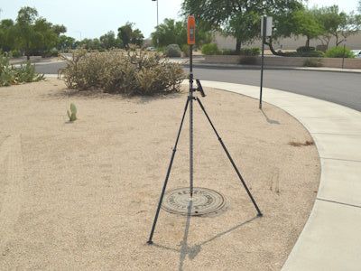 Bad Elf Flex survey-grade RTK rover on a tripod in the field